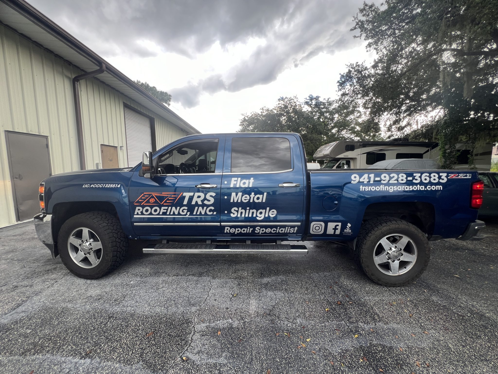 Commercial vehicle graphics combining a partial printed wrap with custom cut vinyl lettering and logos for professional mobile branding.