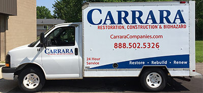 Custom vehicle graphics on box truck for Carrara
