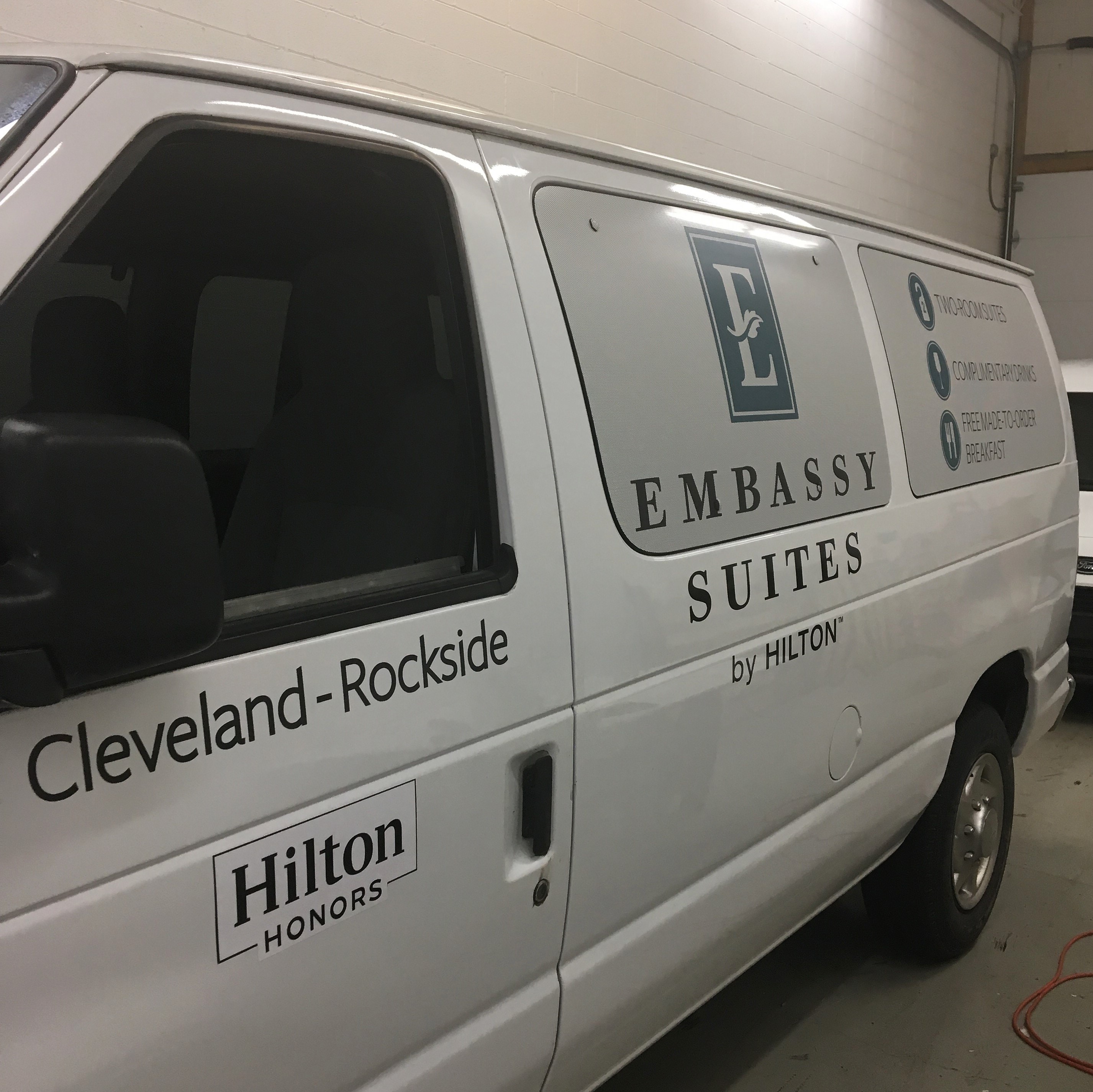 Custom vehicle wrap on van for Embassy Suites Cleveland-Rockside