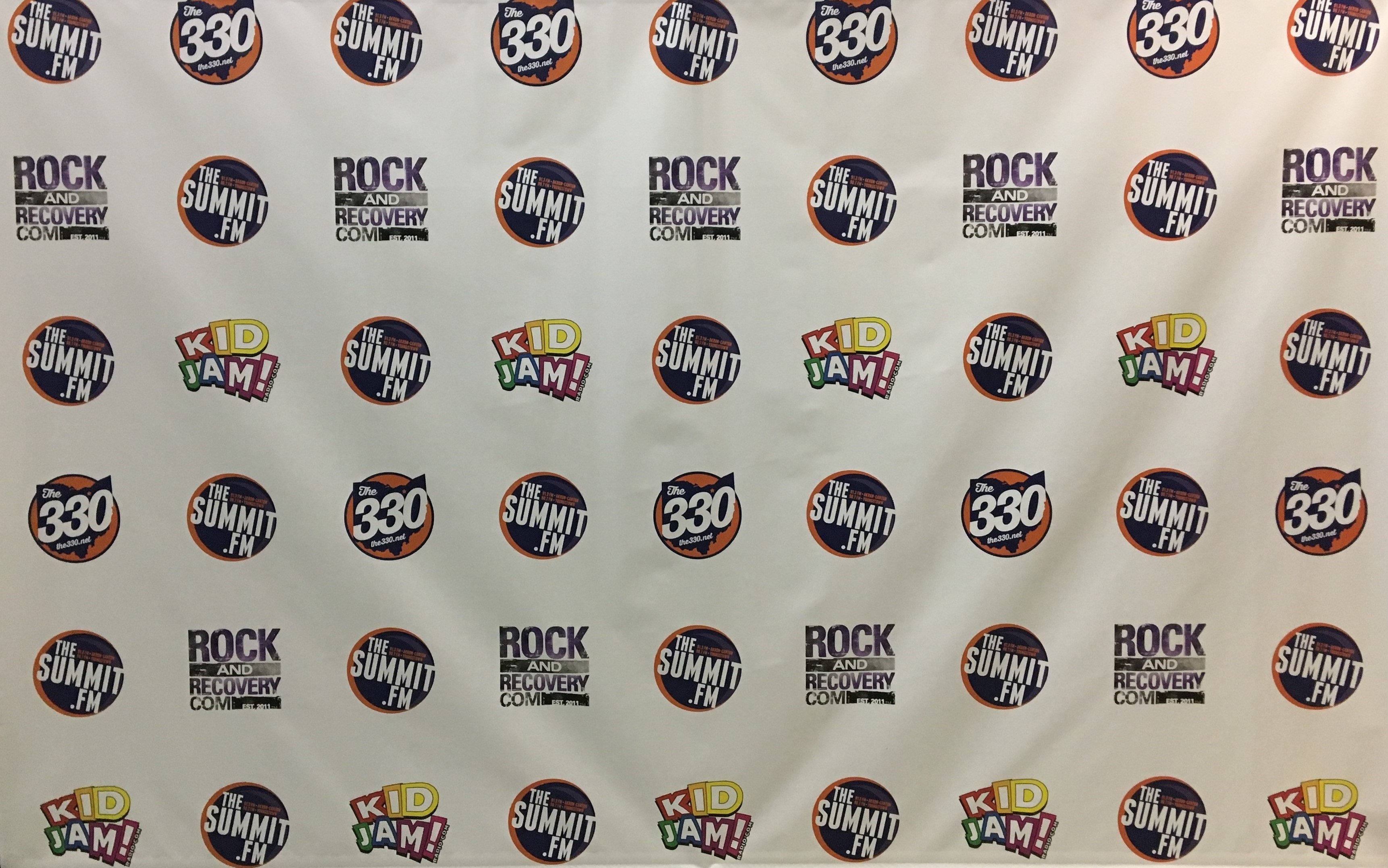 Summit.fm step and repeat banner akron