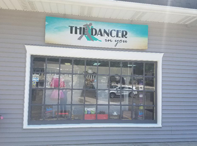 the dancer in you storefront sign 