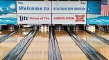A photo of four large vinyl panels above bowling lanes at Station 300 in Cuyahoga Falls, Ohio.