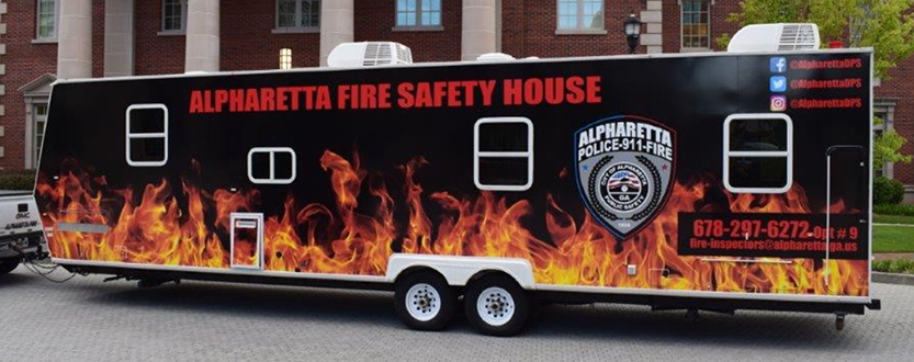 Alpharetta Fire Safety House trailer graphic wrap
