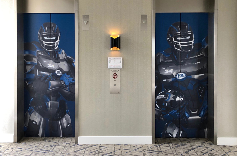 Fox Sports graphic on elevator doors 