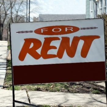 Aframe sign displaying "for rent"