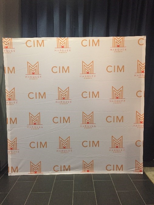 Standing backdrop banner with CIM logo 