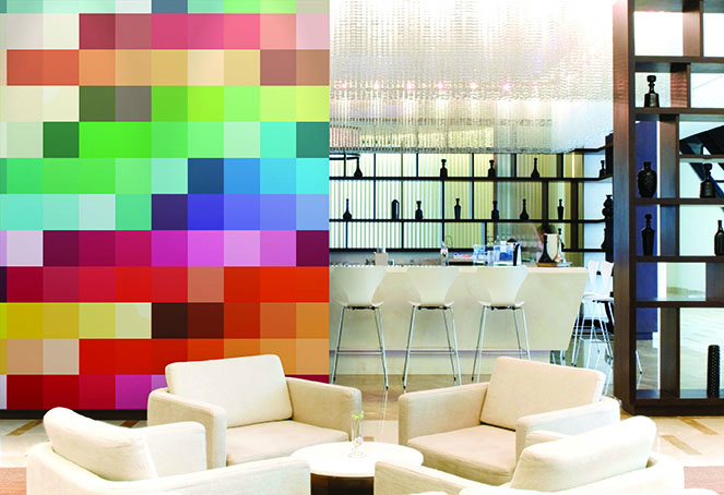 multicolored wall mural in sitting room area