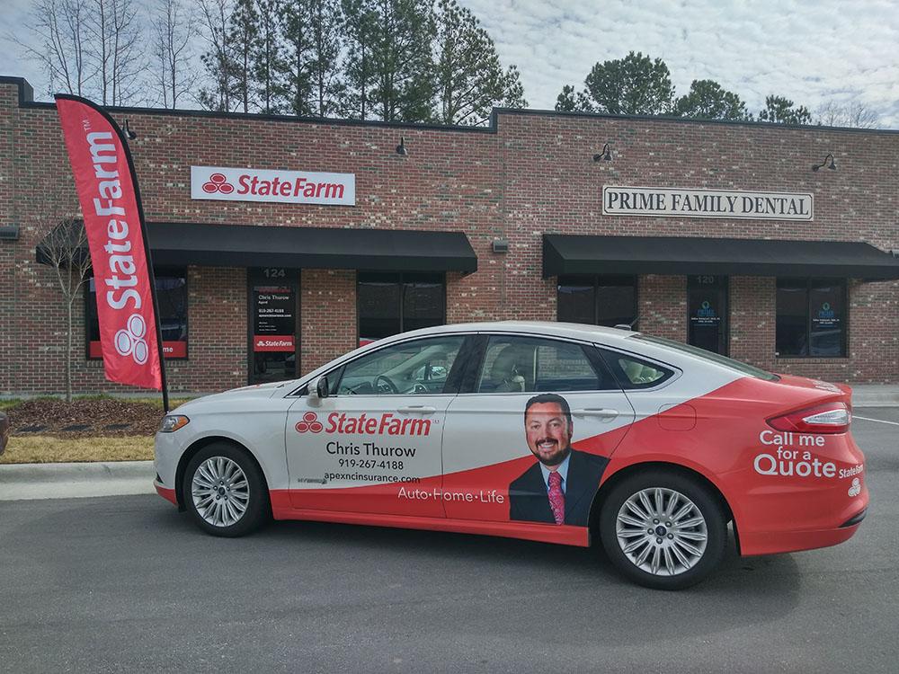 State Farm advertised car in front of State Farm location