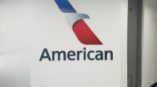 American Airlines logo cut out on wall