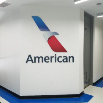 American Airlines logo cut out on wall