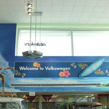 Beach scene printed mural in Volkswagen dealership  
