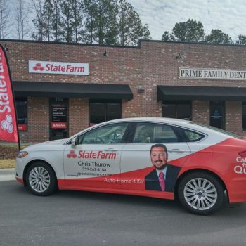 State Farm advertised car in front of State Farm location