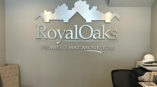 Royal Oaks - metal cut out displayed on wall