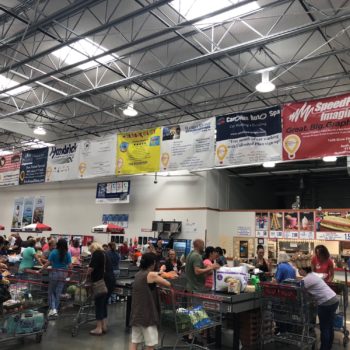 Banners spanning over registers in Costco