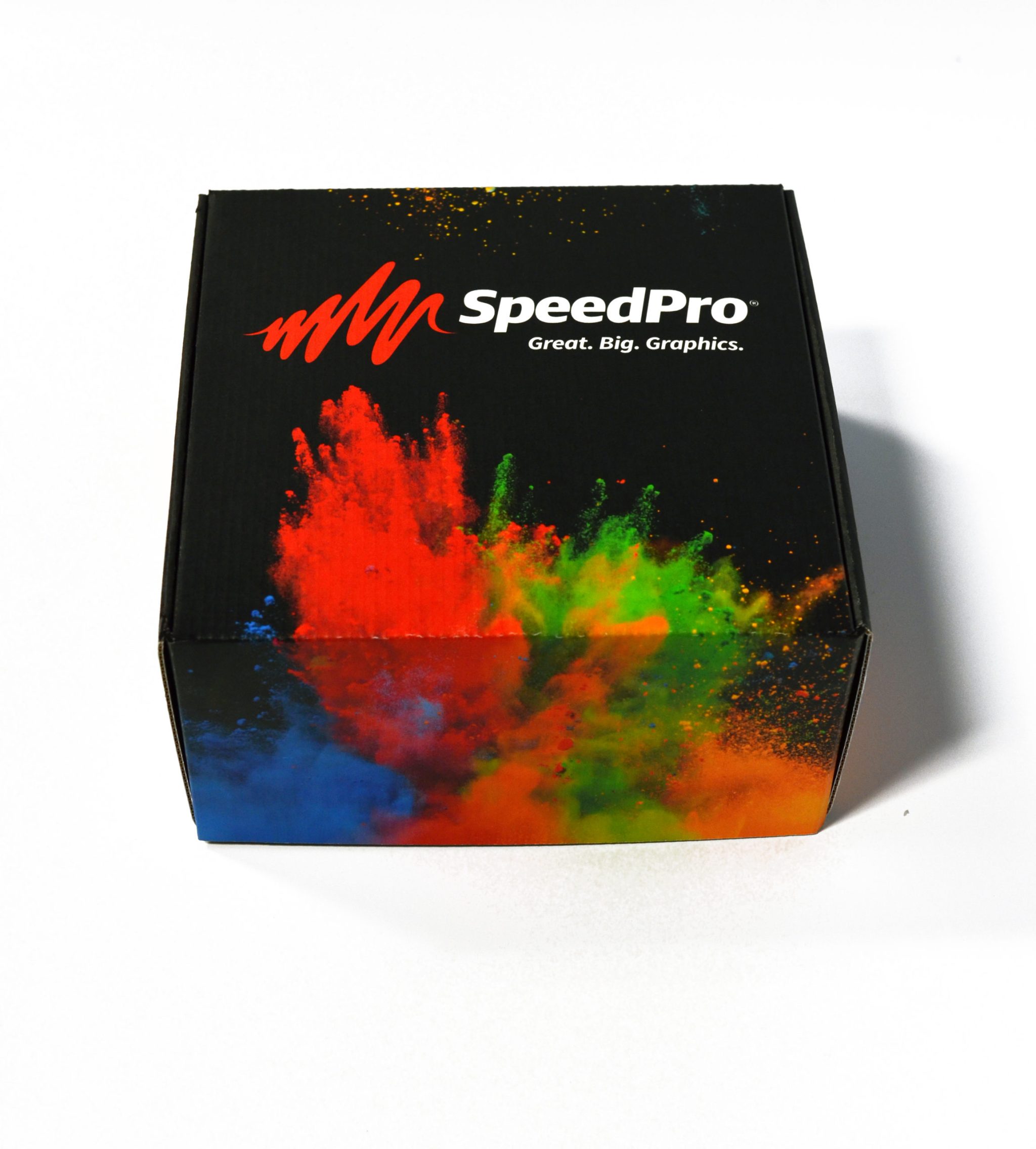 Black box adorned with vibrant paint splatters