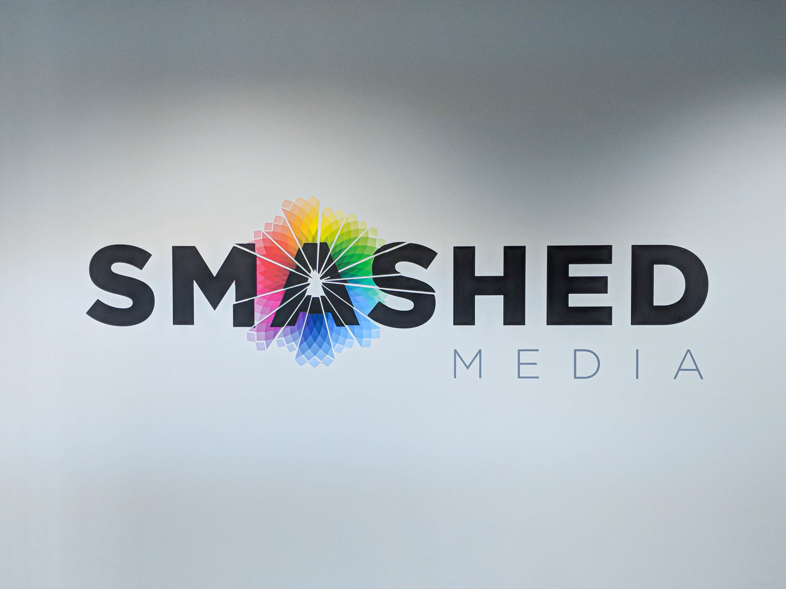 Vinyl Wall Wrap of Smashed Media Logo