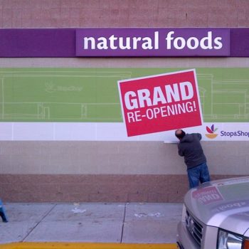 natural foods stop and shop grand re-opening outdoor sign