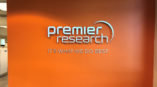 Premier Research logo on the wall