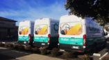 back of custom wrapped fleet of vans for Clutter 