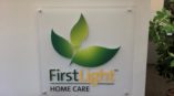first light home care mounted front desk sign