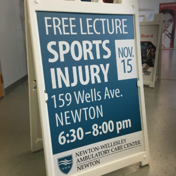 Newton Wellesley free lecture a-frame sign
