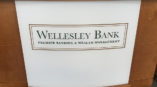 Wellesley Bank front desk sign