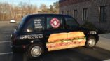 custom vehicle wrap on car for earl of sandwich's business