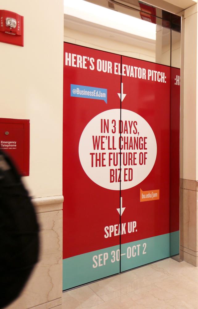 business advertisement over elevator doors