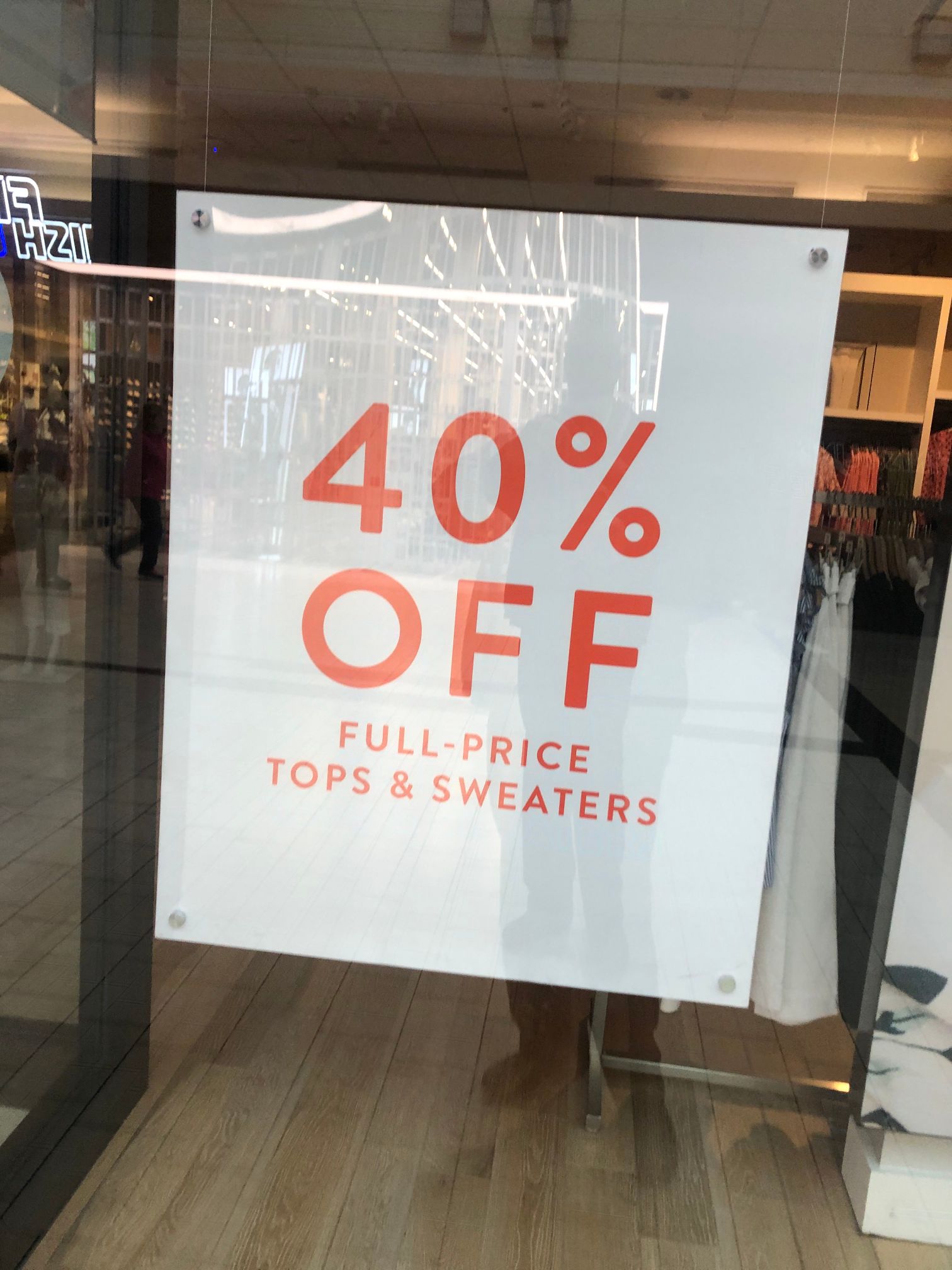 40% off hanging banner in store window 