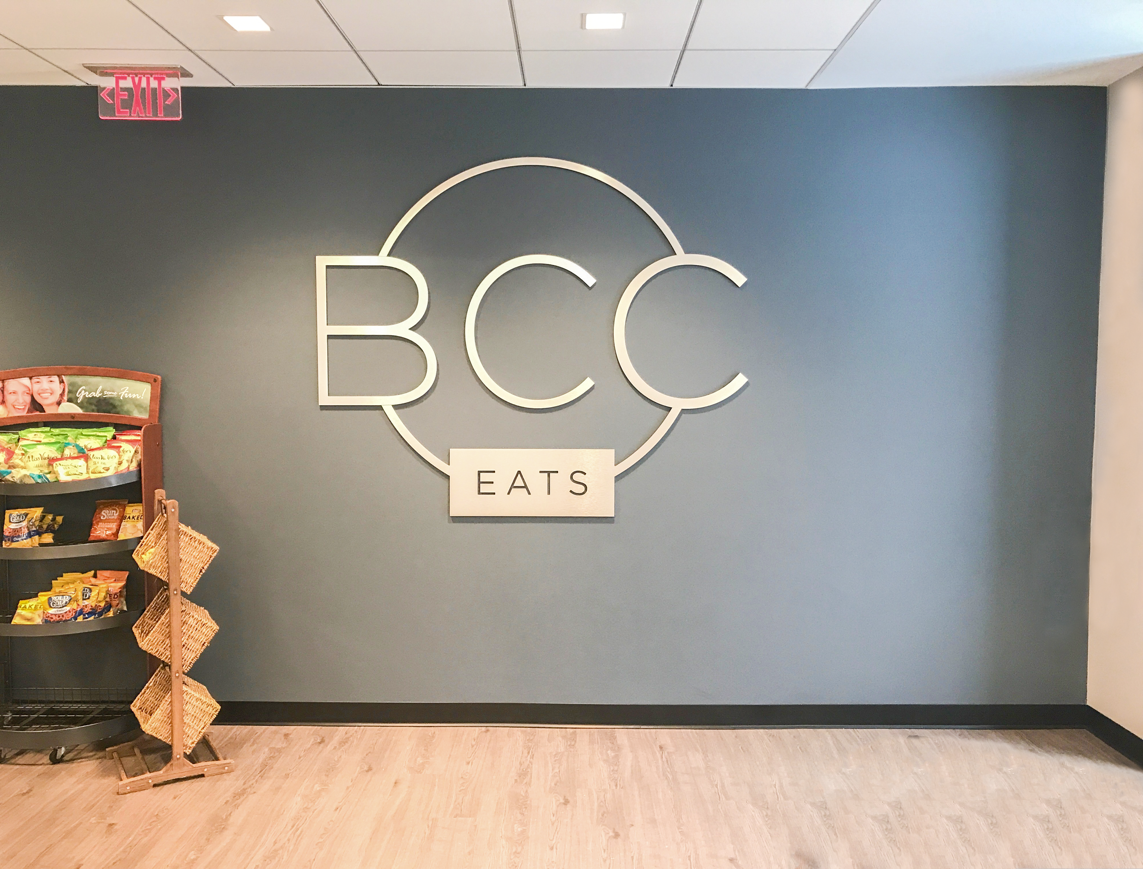 BCC Eats logo on wall signage