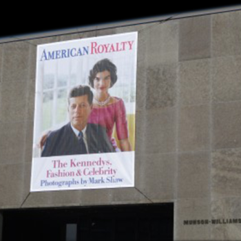 A graphic printed on the side of a car advertising Shelf Genie.