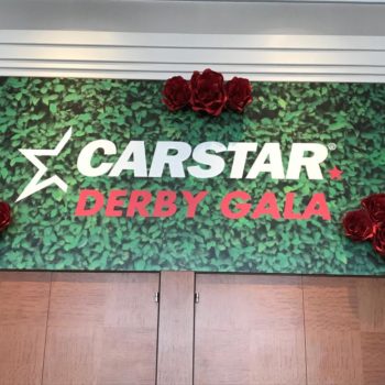 event banner and signs for Carstar Derby Gala