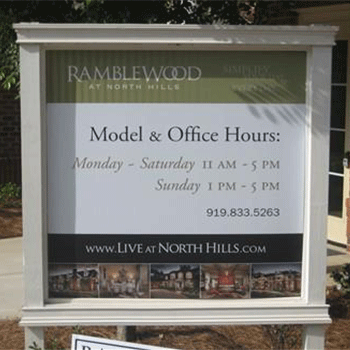 Ramblewood wooden outdoor sign with business hours