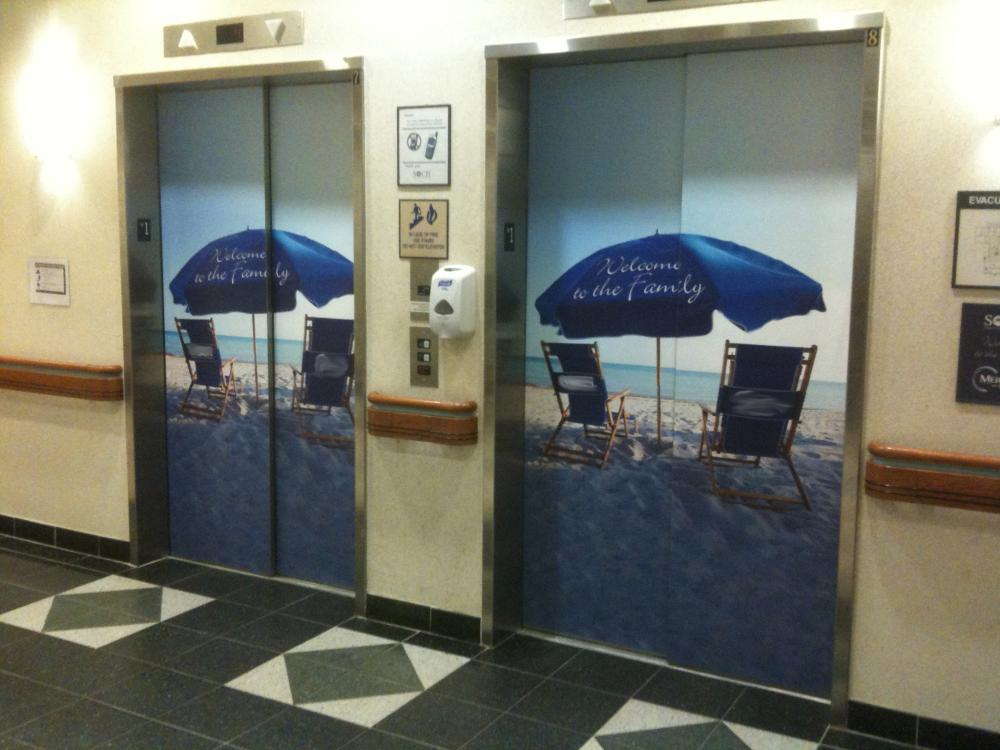 Welcome to the family beach themed elevator wrap