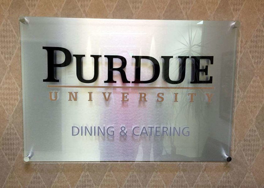 Wall sign for Purdue University Dining and Catering.