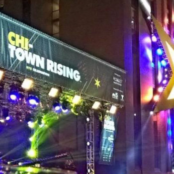 Corona Extra Chi-Town Rising custom banner handing above concert stage.