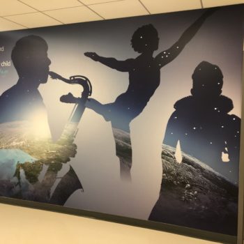 Juilliard wall mural of a musician, dancer, and actor. 
