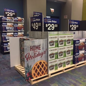 Walmart home appliance displays with custom signage by SpeedPro imaging.