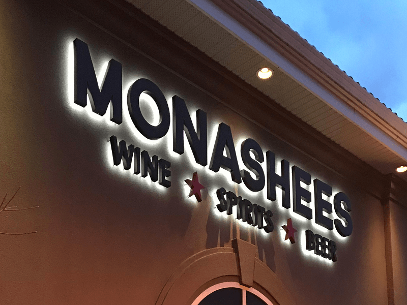 Monashees wine, spirits, and beer custom sign with backdrop lighting.