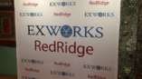 Ex Works and RedRidge custom graphic on the wall. 