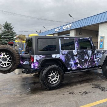 Jeep Painted in Purple and Black Swirls 