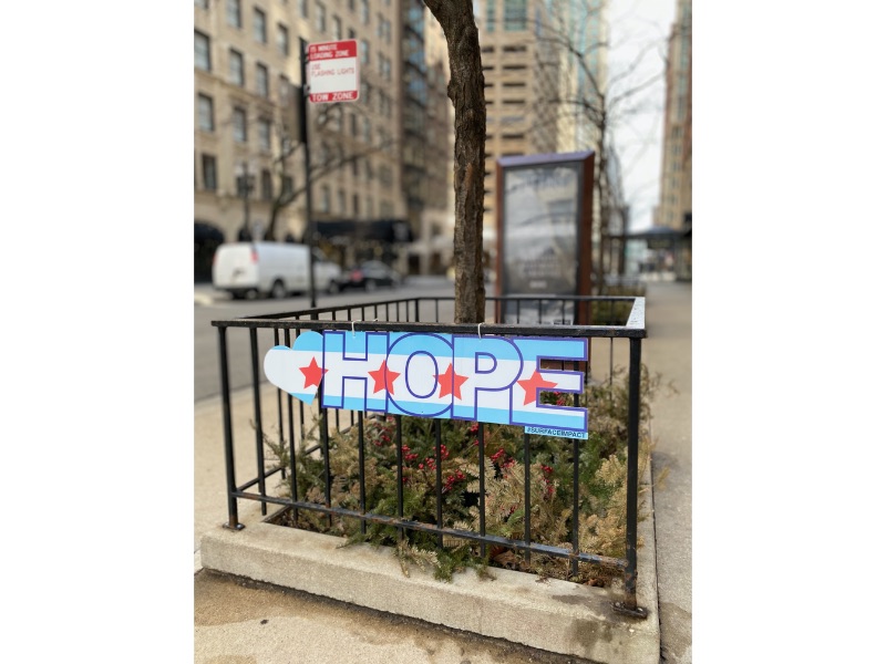 hope sign along the sidewalk