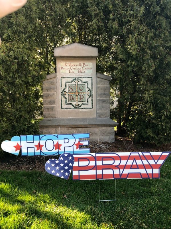 hope and pray sign In front of a church