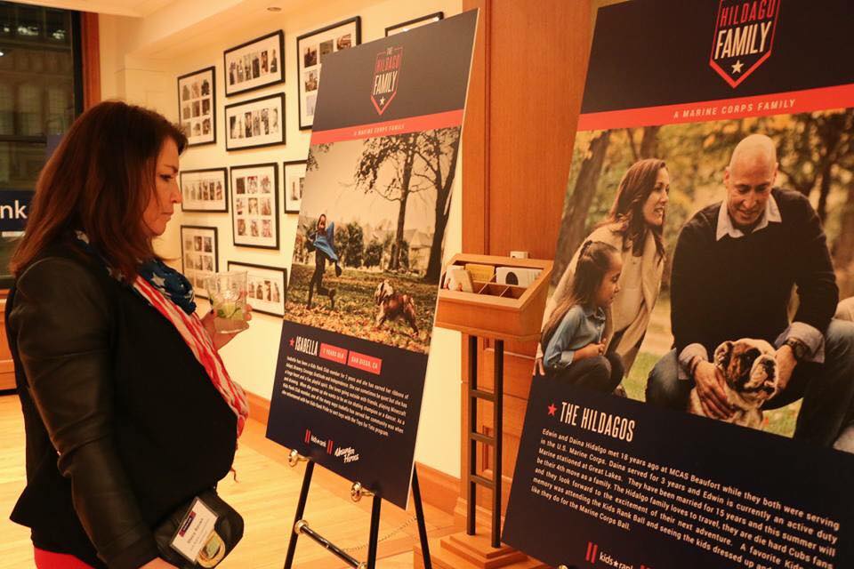 Two large freestanding event posters on easels inside a gallery in Chicago Downtown.
