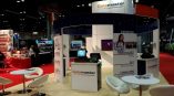 Curved fabric tradeshow display with printed panels and counters in Chicago Downtown.