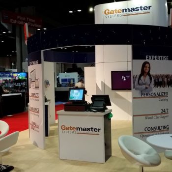 Curved fabric tradeshow display with printed panels and counters in Chicago Downtown.