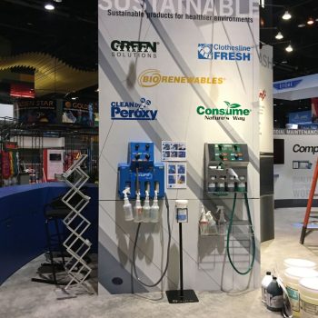 Trade show display wall with mounted dispensers and printed graphics in Chicago Downtown.