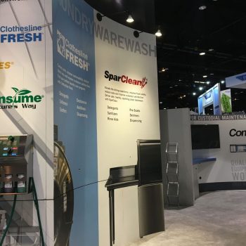 Curved fabric tradeshow display with printed graphics and metal frame in Chicago Downtown.