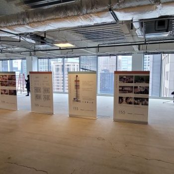 Five retractable vinyl banner stands displayed in an empty office space in Chicago Downtown.