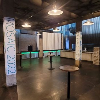 Indoor pillar wraps with event graphics on concrete columns in Chicago Downtown.